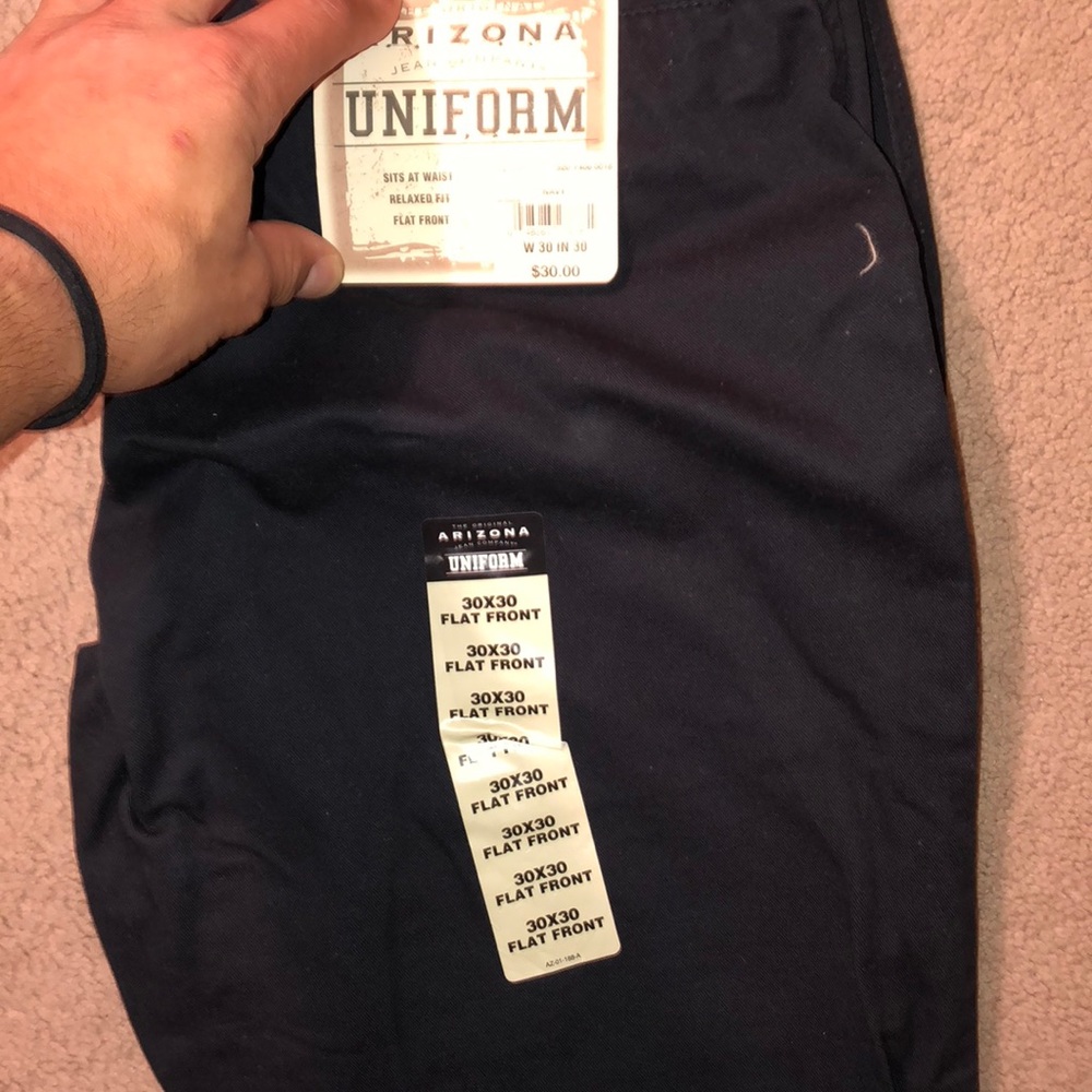 Navy arizona pants has tags
